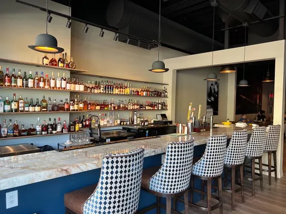 Churchill's cigar bar lounge seating and warm lighting