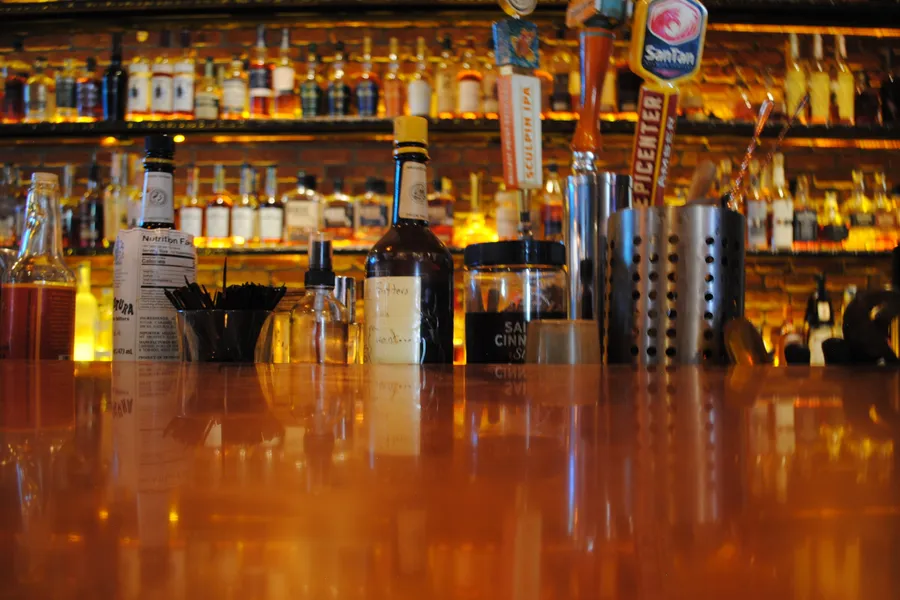 Detailed view of the bar with warm lighting